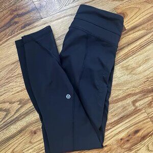 Lululemon Athletica Leggings with zippers and mesh details - size 4